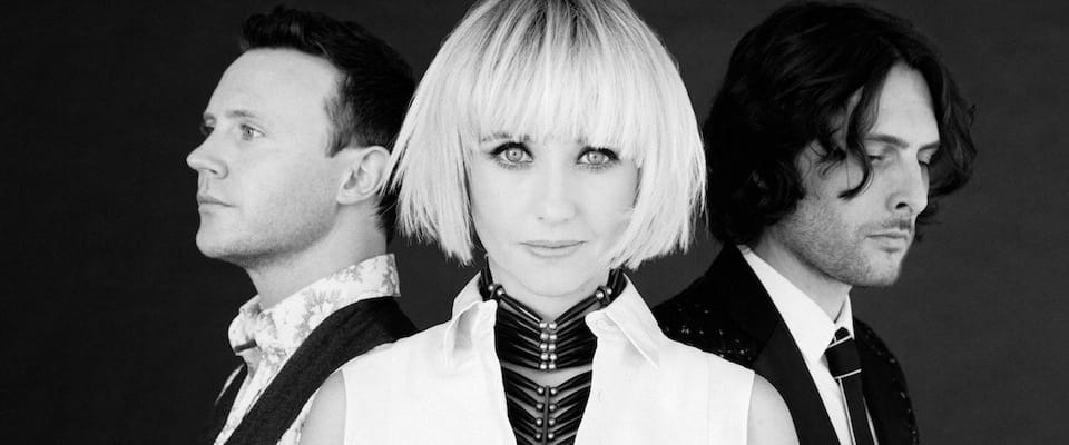 Closeup of three musicians from The Joy Formidable