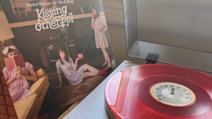 Kissing Other PPl album cover and red vinyl record on player