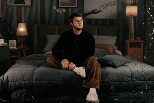 Alex Warren Isn’t Trying to Be “Ordinary” Alex Warren Cover for album You'll Be Alright Kid