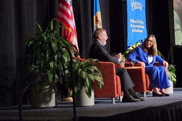 Photo of Sarah McBride sitting with David Redlawsk