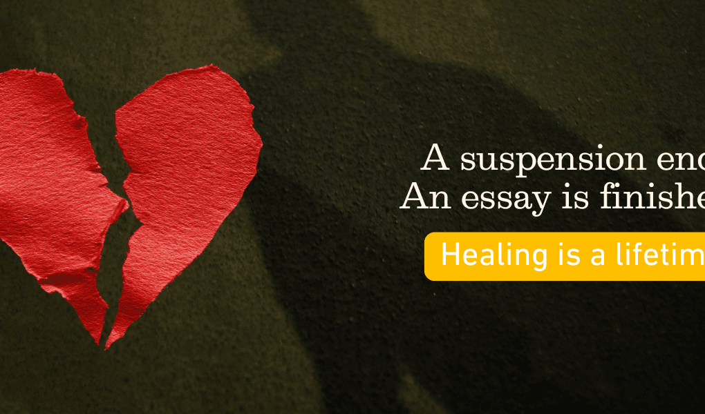 Broken heart, shadow on pavement, words that says A suspension ends. An essay is finished. Healing is a lifeitme.